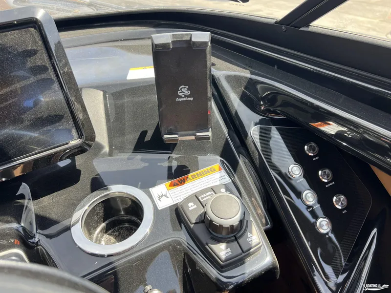 Slide: The Image of Control panel of 2025 Yamaha Boats 255XD with navigation and control buttons. - 11