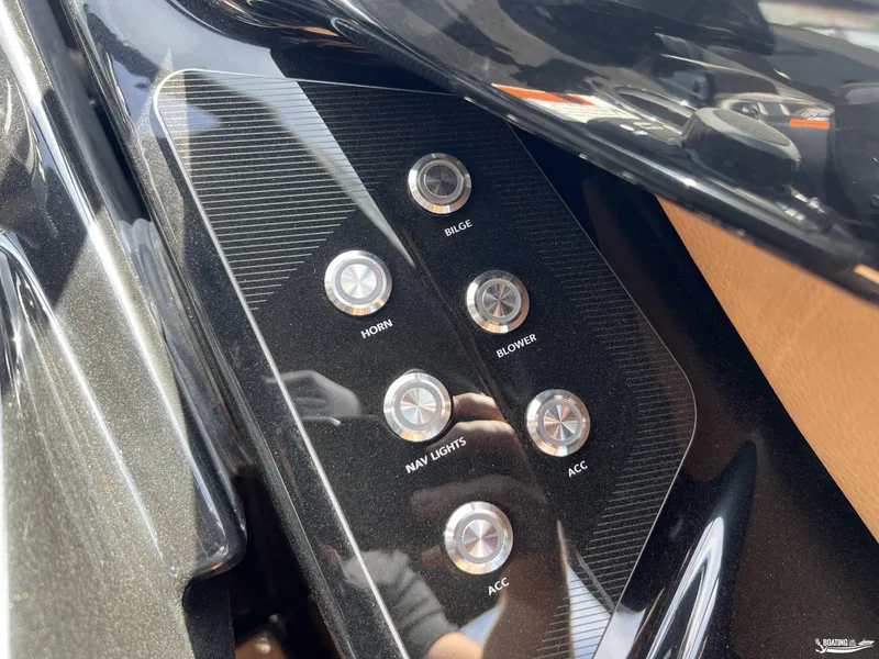 Slide: The Image of Control panel of 2025 Yamaha Boats 255XD with labeled buttons for various functions. - 12