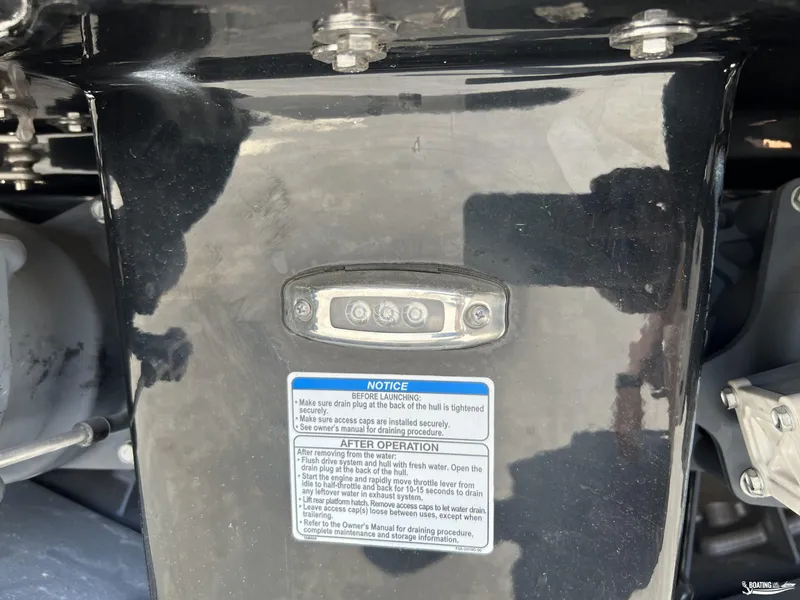 Slide: The Image of 2025 Yamaha Boats 255XD hull with maintenance instructions and LED light. - 23