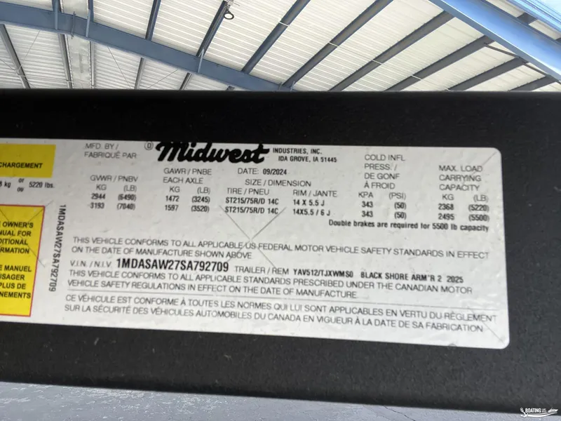 Slide: The Image of Label on a 2025 Yamaha Boats 255XD trailer, detailing specifications and safety standards. - 26