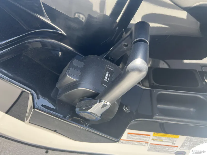 Slide: The Image of Close-up of 2025 Yamaha AR250 boat throttle control. - 11