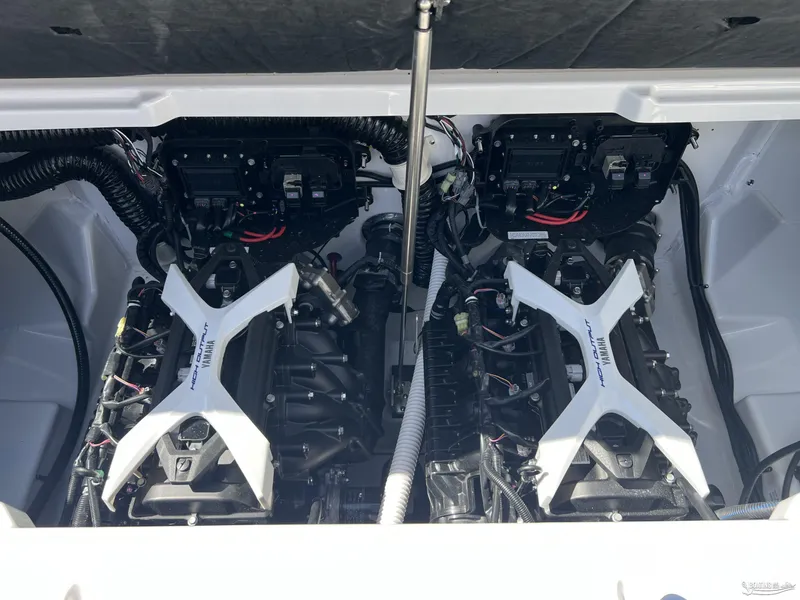 Slide: The Image of 2025 Yamaha AR250 boat engine compartment with dual high-output engines. - 20