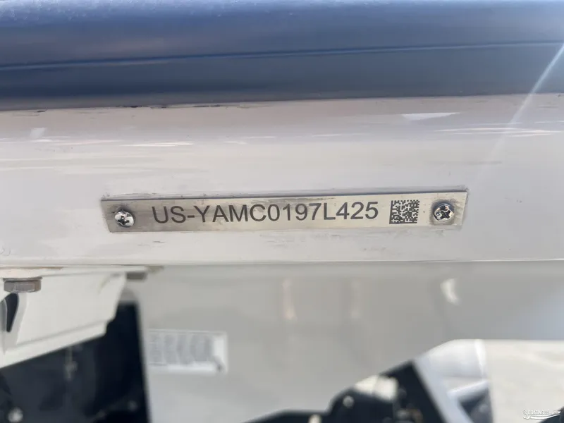 Slide: The Image of 2025 Yamaha Boats AR250 hull identification number plate with QR code. - 24