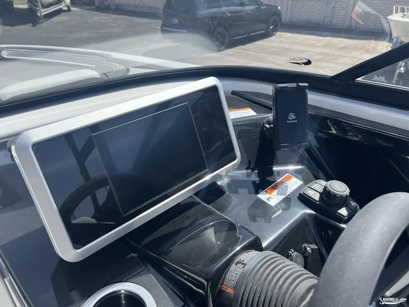 Slide: The Image of 2025 Yamaha AR250 boat dashboard with touchscreen and controls. - 8