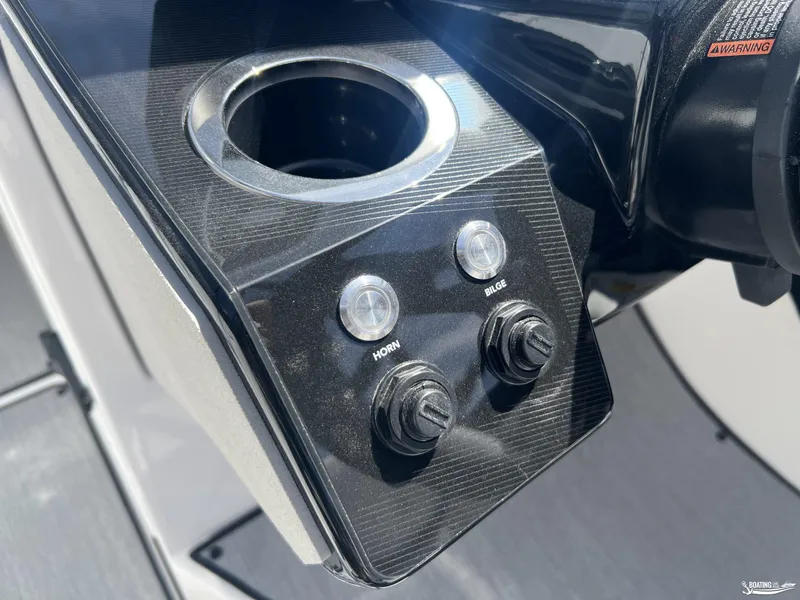 Slide: The Image of Control panel of 2025 Yamaha AR250 boat with horn and bilge switches. - 9