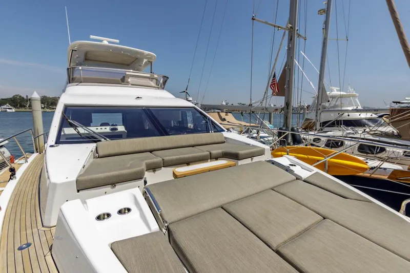 Slide: The Image of 2021 Azimut 60 Flybridge yacht with spacious deck and luxurious seating. - 40