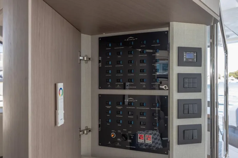 Slide: The Image of Azimut 60 Flybridge 2021 yacht control panel with modern switches and displays. - 45