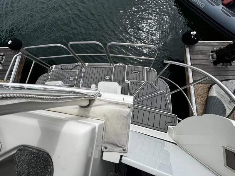 Slide: The Image of 2005 Cruisers Yachts 405 Express Motoryacht stern view at dock. - 21