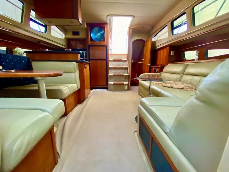 Slide: The Image of Luxurious interior of 2005 Cruisers Yachts 405 Express Motoryacht with plush seating and elegant design. - 25