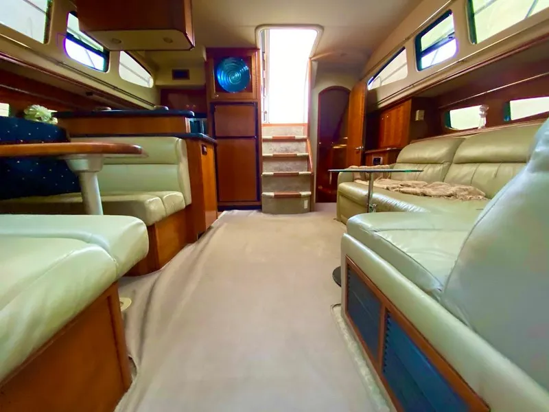 Slide: The Image of Interior of 2005 Cruisers Yachts 405 Express Motoryacht with luxurious seating and elegant design. - 26