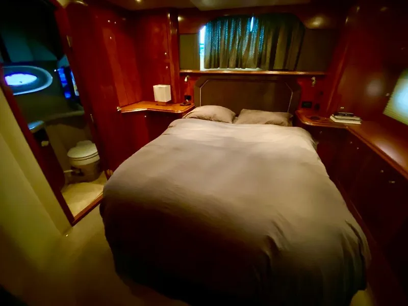 Slide: The Image of Luxurious bedroom in 2005 Cruisers Yachts 405 Express Motoryacht with ensuite bathroom. - 27