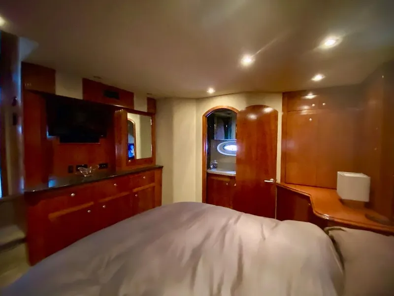 Slide: The Image of Luxurious cabin interior of 2005 Cruisers Yachts 405 Express Motoryacht with wood finish. - 30