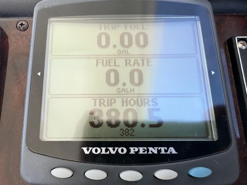 Slide: The Image of Volvo Penta display showing trip fuel, fuel rate, and trip hours for 2005 Cruisers Yachts 405. - 42