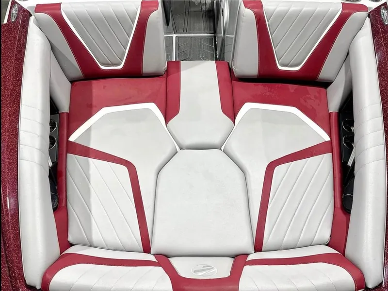 Slide: The Image of 2020 Tigé 22RZX boat interior with red and white upholstery. - 4