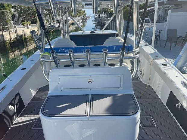 Slide: The Image of 2020 Freeman 34VH boat interior with fishing rod holders and seating. - 11