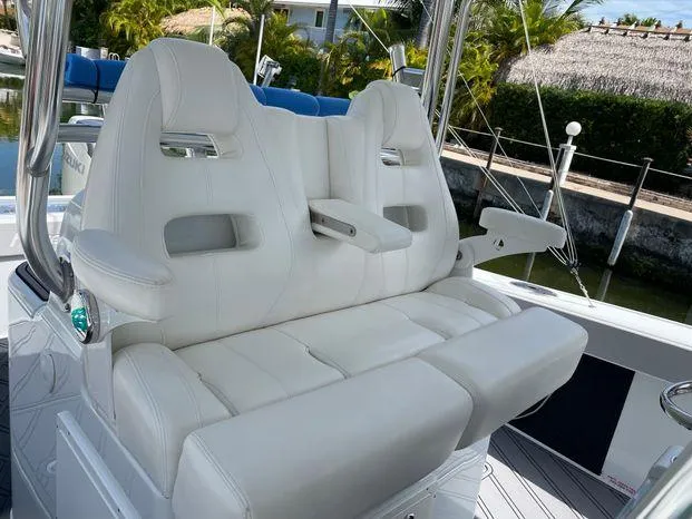 Slide: The Image of Luxury seating on a 2020 Freeman 34VH boat, featuring plush white upholstery. - 27