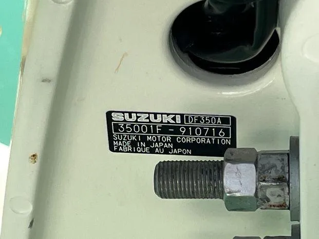 Slide: The Image of Label on Suzuki DF350A engine, showing serial number and manufacturing details. - 31