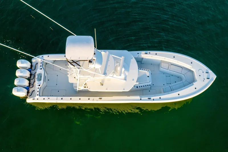 Slide: The Image of Aerial view of 2021 Yellowfin 42 boat on clear water. - 17