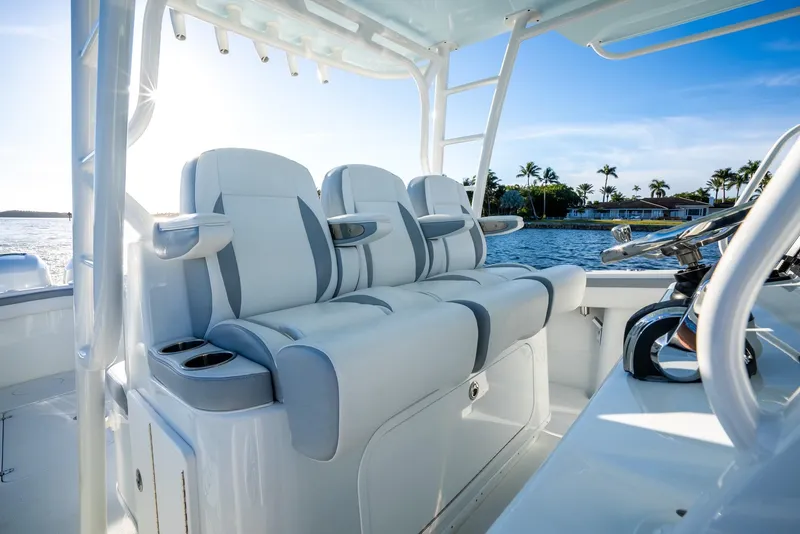 Slide: The Image of Luxurious seating on 2021 Yellowfin 42 boat, with ocean view and palm trees. - 25