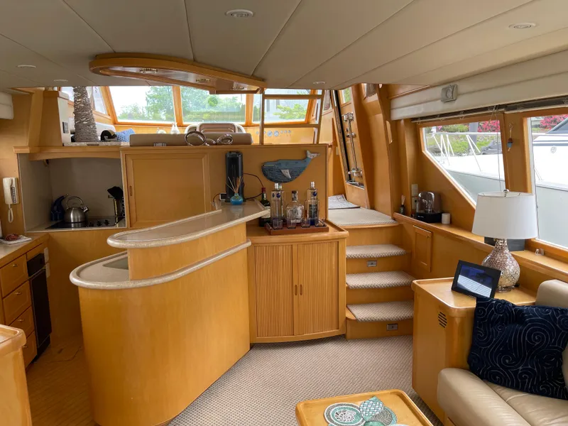 Slide: The Image of Luxurious interior of a 2000 McKinna 57 Pilothouse yacht with modern amenities. - 3