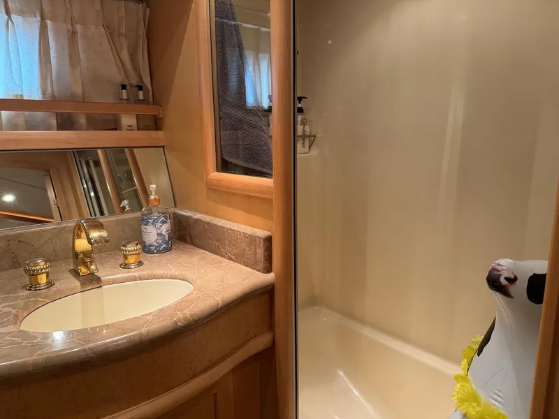 Slide: The Image of Luxurious bathroom in 2000 McKinna 57 Pilothouse yacht with elegant fixtures. - 36