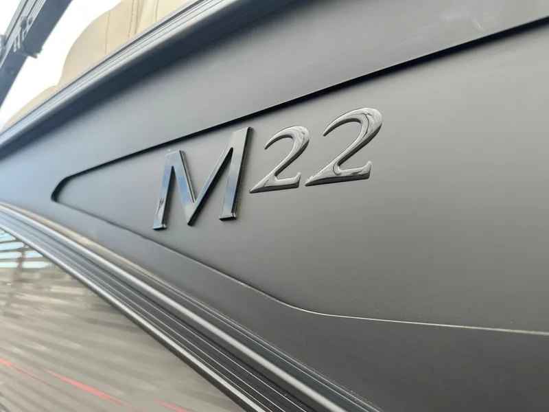 Slide: The Image of Close-up of 2025 Bennington 22MFB boat model emblem. - 3