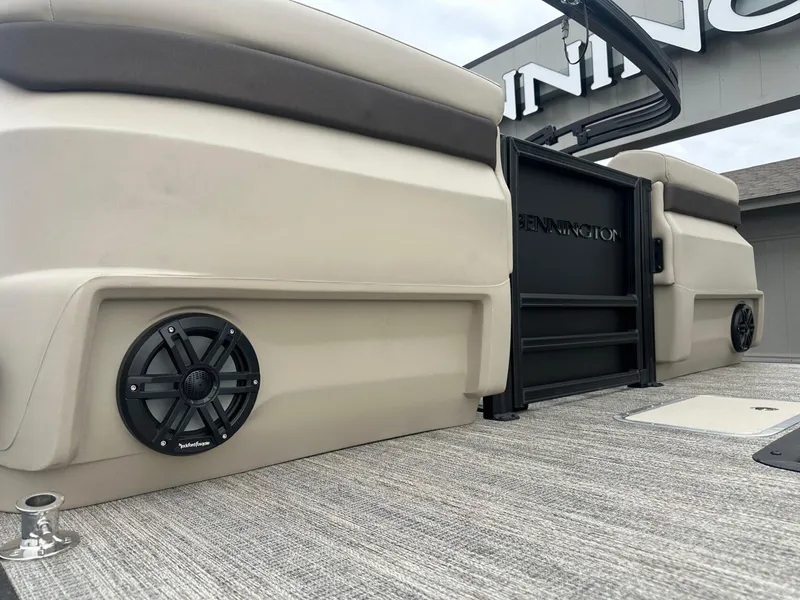 Slide: The Image of 2025 Bennington 22MFB pontoon boat with speaker and sleek design. - 5