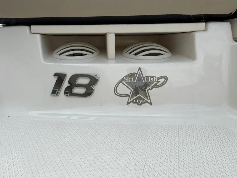 Slide: The Image of 2014 Chaparral 18 Ski & Fish H2O boat emblem and logo detail. - 10