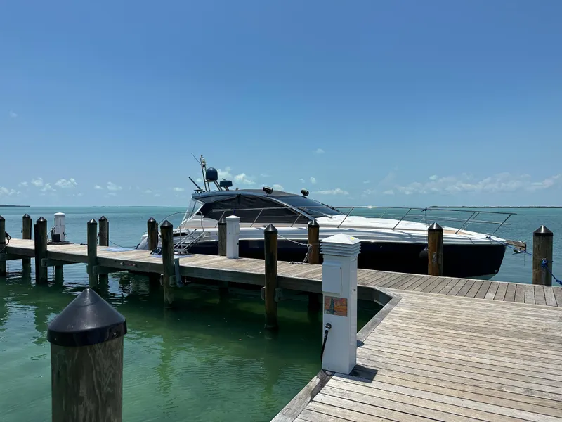 Slide: The Image of 2021 Azimut Atlantis 45 yacht docked at a sunny marina. - 25