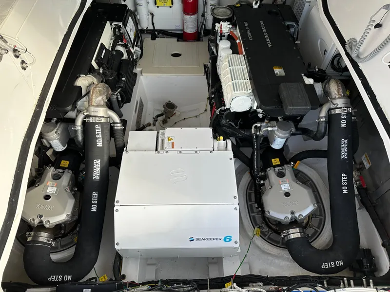 Slide: The Image of Engine room of 2021 Azimut Atlantis 45 yacht, showcasing dual engines and mechanical components. - 47
