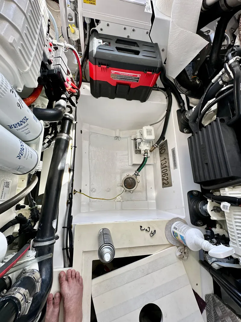 Slide: The Image of Engine compartment of a 2021 Azimut Atlantis 45 yacht, showcasing mechanical components. - 49