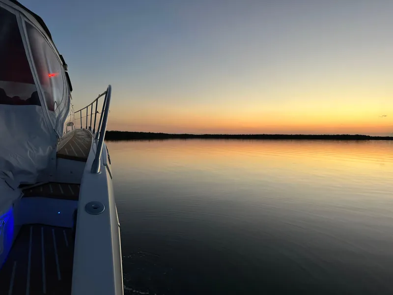 Slide: The Image of Azimut Atlantis 45 yacht at sunset on calm waters, 2021 model. - 7