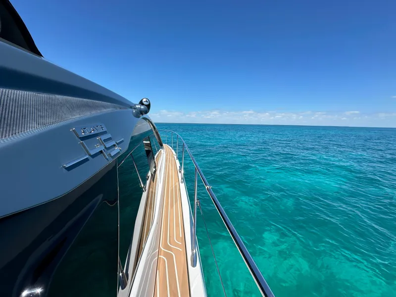 Slide: The Image of Azimut Atlantis 45 yacht cruising on clear blue ocean, 2021 model. - 8