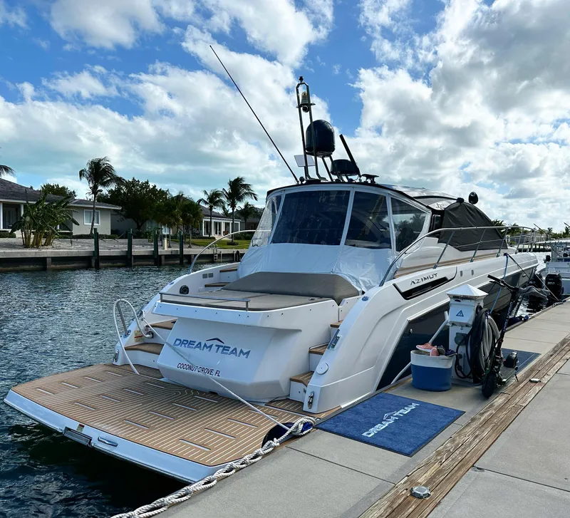 Slide: The Image of 2021 Azimut Atlantis 45 yacht docked, featuring sleek design and modern amenities. - 9