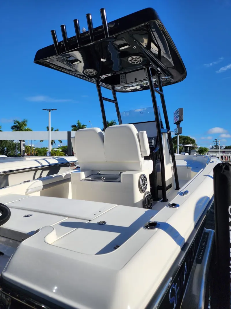 Slide: The Image of 2023 ShearWater 250 XTE boat with sleek design and modern features. - 3