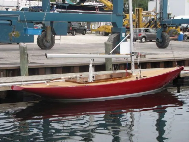 Slide: The Image of Red Rustler 24 sailboat docked at marina, 2025 model. - 11