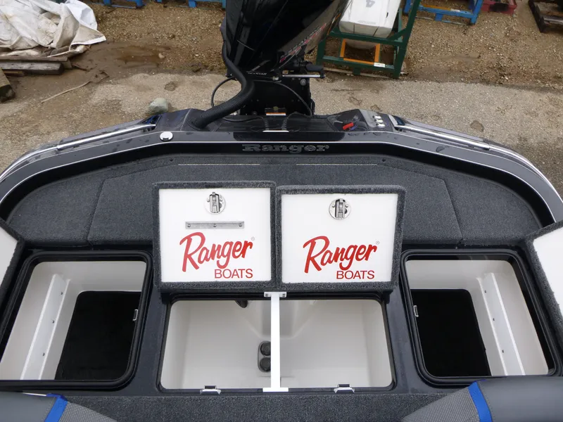 Slide: The Image of 2025 Ranger Z521 boat storage compartment with open lid, showcasing interior space and equipment. - 11