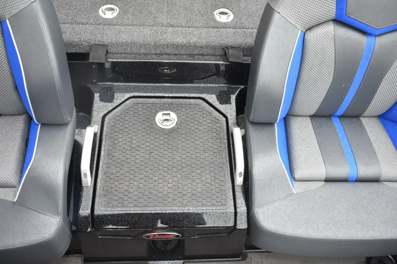 Slide: The Image of 2025 Ranger Z521 boat interior with gray and blue seats and storage compartment. - 19