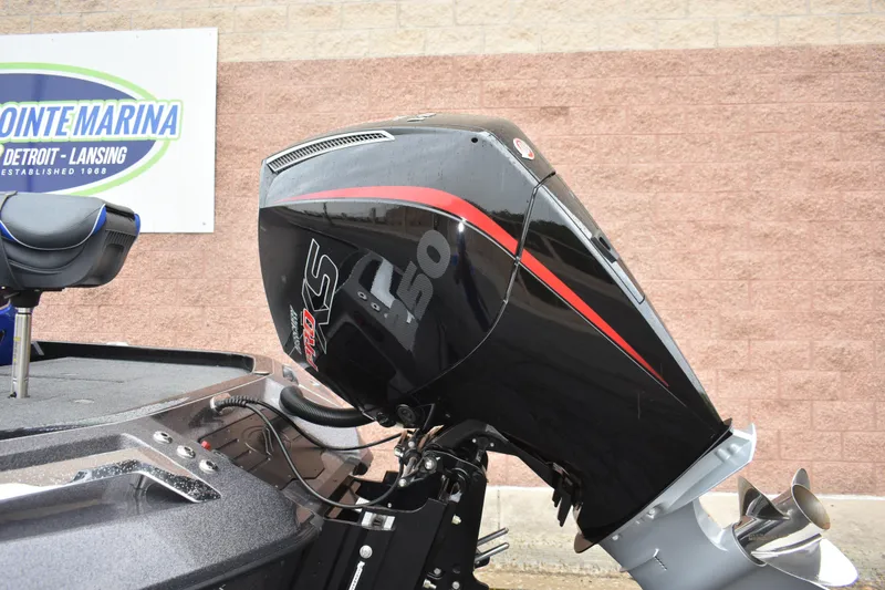 Slide: The Image of 2025 Ranger Z521 boat with powerful outboard motor at Pointe Marina. - 2