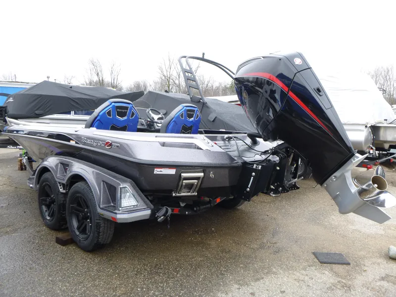Slide: The Image of Steering wheel of 2025 Ranger Z521 boat with modern dashboard controls. - 7