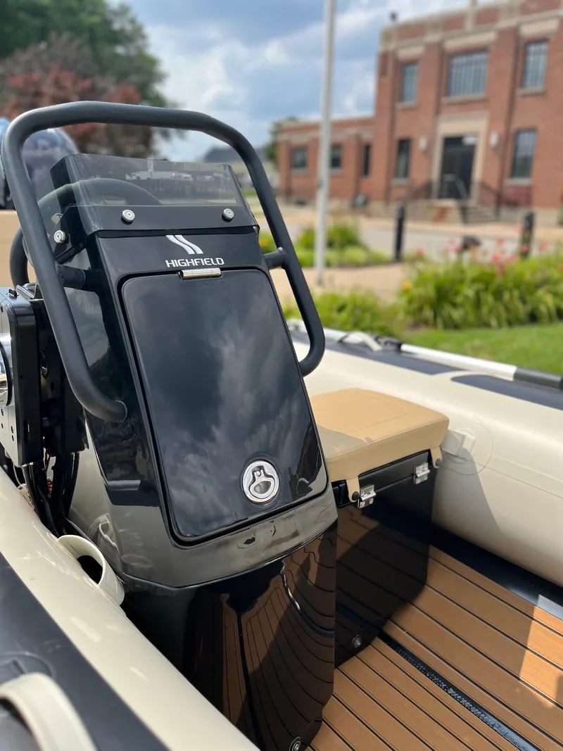 Slide: The Image of 2025 Highfield Classic 360 GT boat with sleek design and modern features. - 8