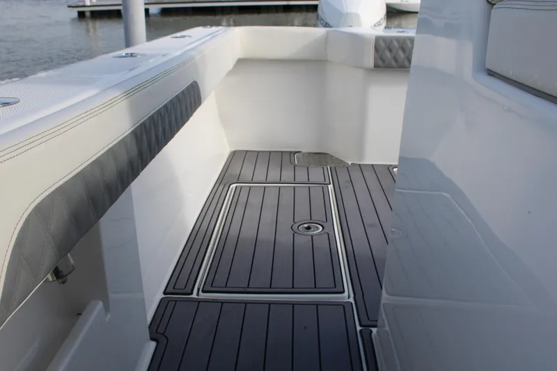 Slide: The Image of 2023 Front Runner 33 Center Console boat interior with sleek deck design. - 12