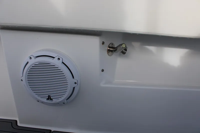 Slide: The Image of 2023 Front Runner 33 Center Console speaker and fixture detail. - 16