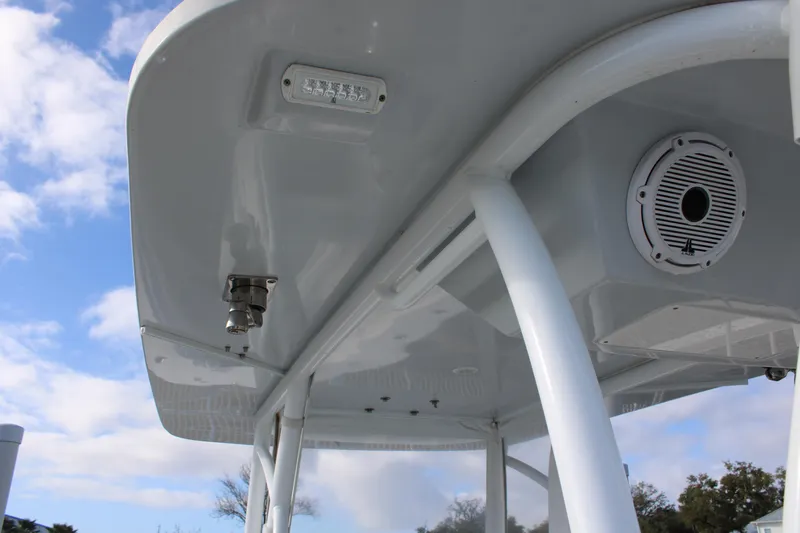 Slide: The Image of 2023 Front Runner 33 Center Console boat roof with speaker and light. - 24