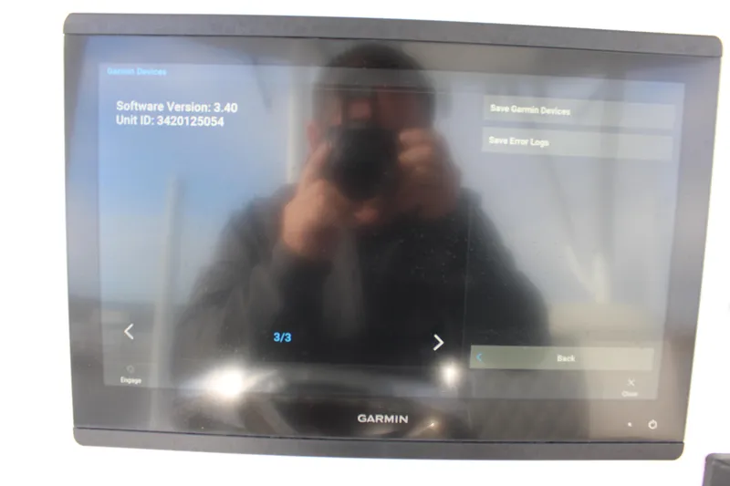 Slide: The Image of Garmin display on 2023 Front Runner 33 Center Console boat, showing software version 3.40. - 33