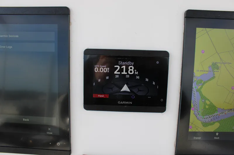 Slide: The Image of Garmin navigation display on 2023 Front Runner 33 Center Console boat dashboard. - 34