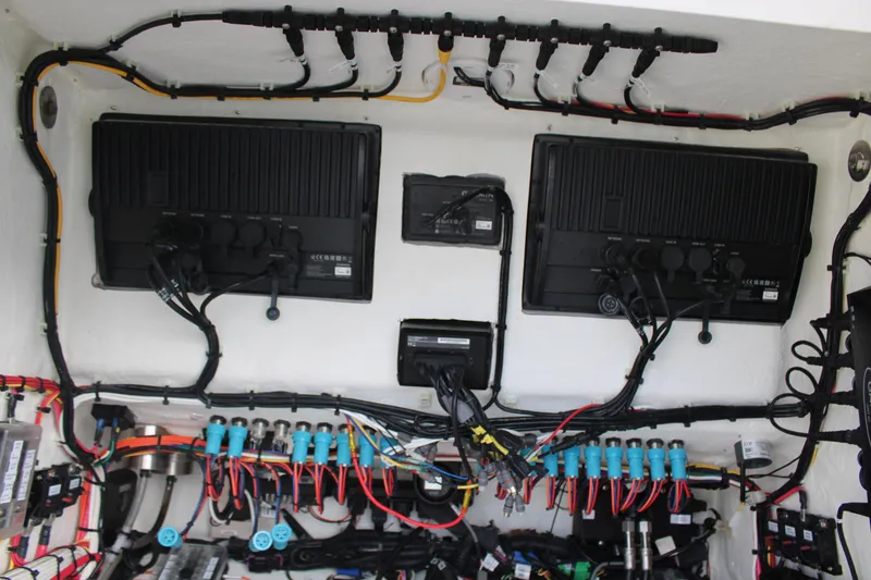 Slide: The Image of 2023 Front Runner 33 Center Console electrical system with wiring and components. - 47