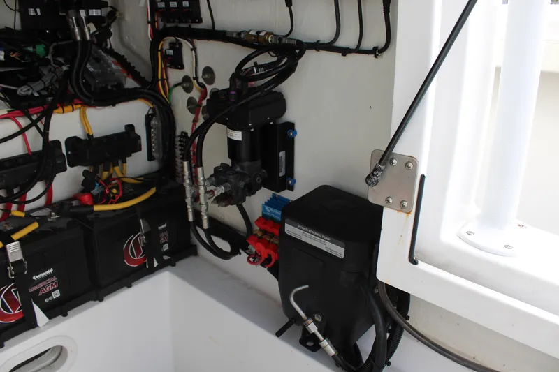 Slide: The Image of 2023 Front Runner 33 Center Console electrical system with batteries and wiring. - 49