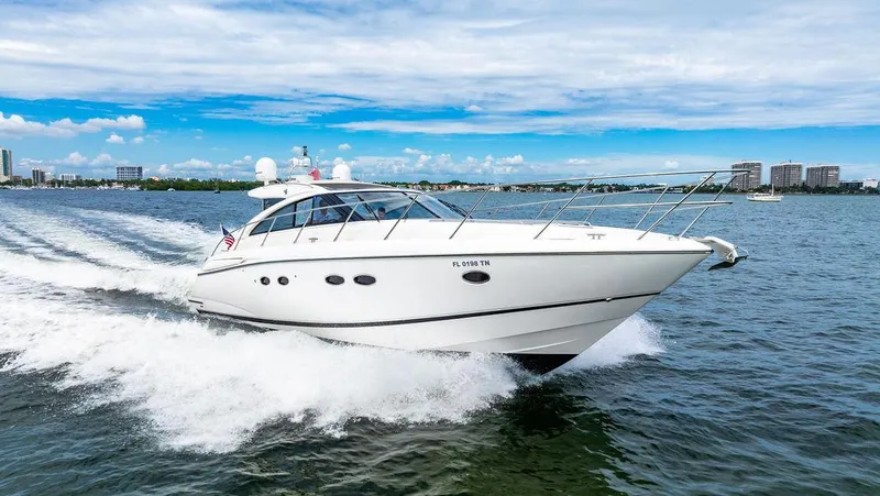 Slide: The Image of 2012 Princess V45 yacht cruising on open water. - 0