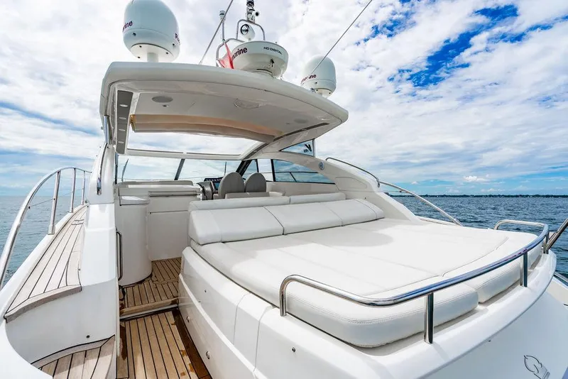 Slide: The Image of Luxurious 2012 Princess V45 yacht with spacious deck and modern design on open water. - 1